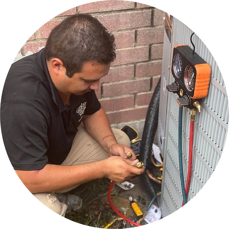 Texas Pride Worker Repairing HVAC System